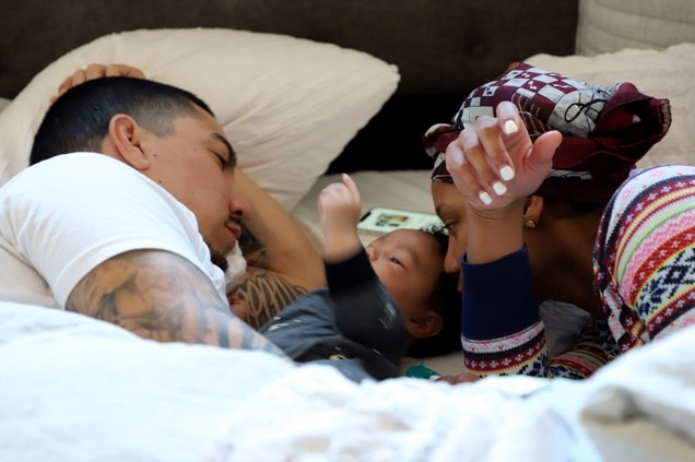 Jade, 33 and Ricky Ramos, 33, go through their usual routine of spending the day at home taking care of baby Kayson