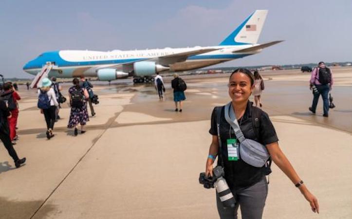 Sarabeth Maney in front of a plane